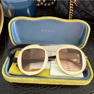 Gucci Women's Sunglasses in Gold and Cream